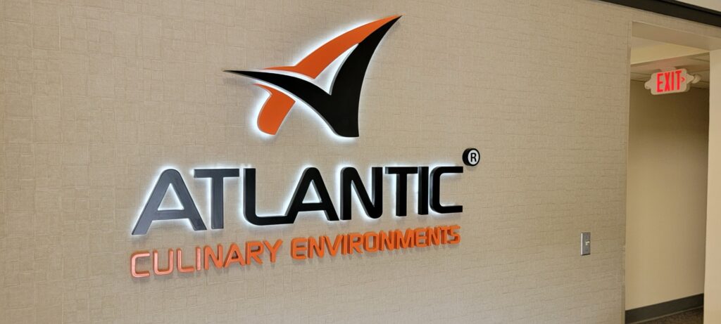 Large fabricated channel letters on pallets in the 21st Century Signs shop